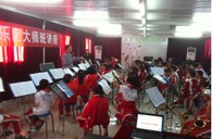 贵阳市花溪区第二小学黄金城集团实验乐团乐队大师班活动 